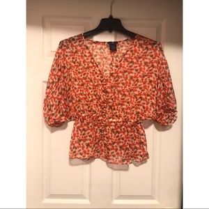 Sheer floral blouse. Snitched waste. Super cute